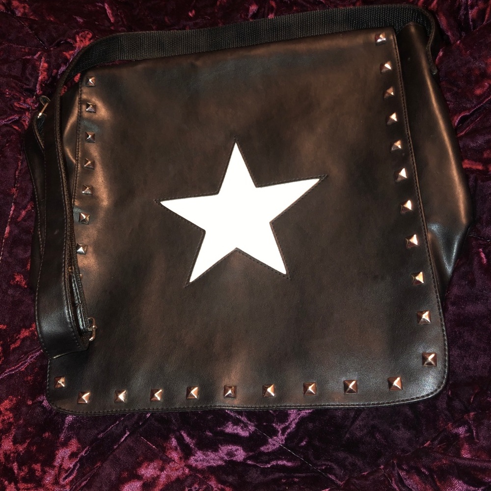 Crossbody black faux leather bag . Never used excellent condition